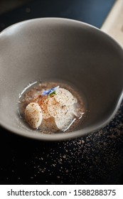 Daikon Soup With Katsuobushi On Dark Background.