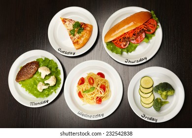 Daily Menu. Plates With Food On Table