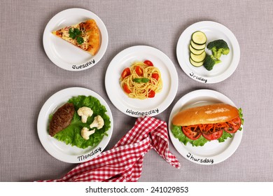 Daily Menu. Plates With Food On Table