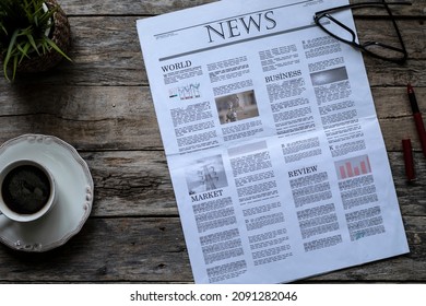 daily newspaper over wooden table - Powered by Shutterstock