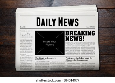 Daily Newspaper with wooden background. - Shutterstock ID 384014077