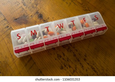 Daily Pill Organizer Filled With Pills