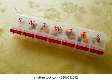 Daily Pill Organizer Filled With Pills