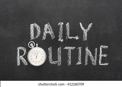 daily routine phrase handwritten on chalkboard with vintage precise stopwatch used instead of O