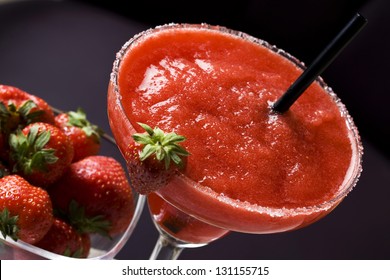 Daiquiri cocktail with strawberries and ice