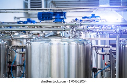 Dairy Factory With Milk Pasteurization Tank And Pipes