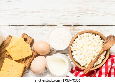 Dairy Product At White Wooden Table.