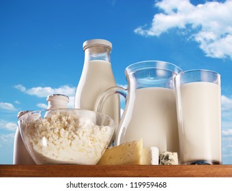Dairy products on the sky background.