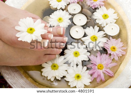 Daisies, candles and pedicured feet