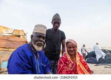 Dakar, Senegal - 28 January 2019 - Family at the port with fishermen at Dakar, Senegal