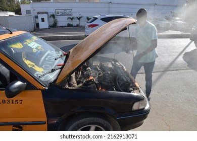 Dakar, Senegal, Africa, May 22 2022, A Taxi Catches Fire In A Street In Dakar
