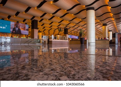 DAKAR, SENEGAL, FEBRUARY 22 2018: Departure Hall On The New Blaise Diagne Airport In Dakar. Interior Made Of Marble Floor, Pillars And Wavy Roof. Some LCD Screens Are Visible.