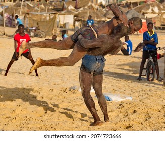 Dakar. Senegal. October 13, 2021. Two Senegalese wrestlers on the seashore participate in a Laamb wrestling match. Laamb is the only martial art where blows are struck with bare hands.