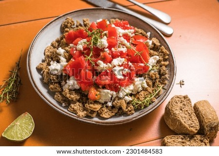 Dakos greece salad. Rusks with tomatoes and feta cheese.