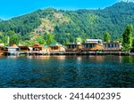 Dal Lake and the beautiful mountain range in the background, in the summer Boat Trip, of city Srinagar Kashmir India.