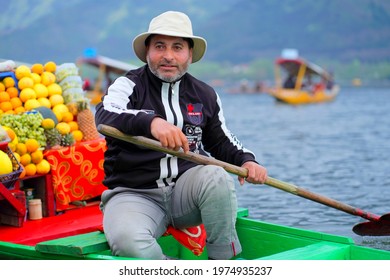 Dal lake, Srinagar, India dated 11.04.2019. Life at Dal lake- Srinagar, vendors selling  items in Shikara boat in morning glory.