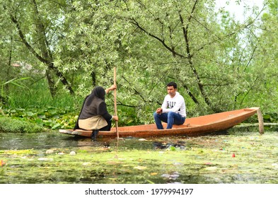 Dal lake, Srinagar, Jammu and kashmir, India dated 14.05.2016- The beauty of Dal lake and the beautiful Shikaras is the most charming thing in Kashmir. Locals life at dal lake.