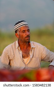 Dal Lake,Srinagar,kashmir,India-July17,2014: Portrait of a Local kashmiri Boat man at Dal Lake after Sunset,Srinagar,Jammu and Kashmir,India