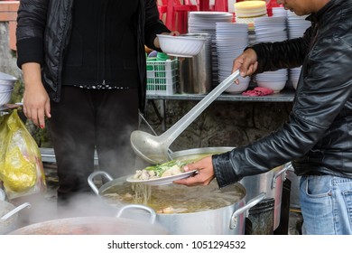 DALAT, VIETNAM - APR. 11 : Street Vendor Cooking Boiled Chicken (street Food) At Dalat Market On April 11, 2016