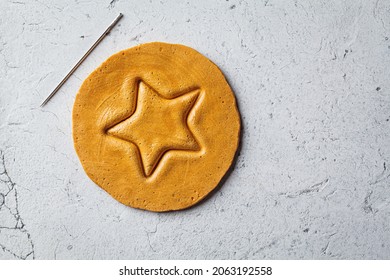 Dalgona Candy - South Korean Treat. Round Sugar Cookie With A Star Inside, Top View.