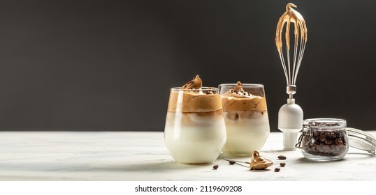 dalgona coffee, Recipe popular Korean drink latte with foam of instant coffee, banner, menu, recipe place for text. - Shutterstock ID 2119609208