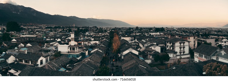 Dali old town rooftop view at sunset. Yunnan, China.