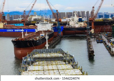 Dalian / China - 2019 July 30 : Container vessel entering dry dock in COSCO Shipyard