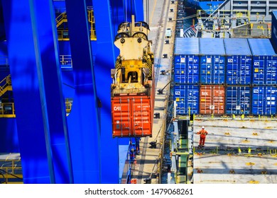 Dalian / China - July 22 2019 : Loading Containers Cargo Operation