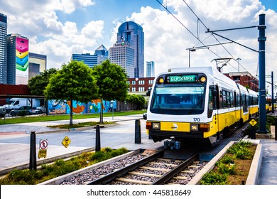 DALLAS - CIRCA JULY 2013: The Dallas DART Light Rail Train Drives Through Deep Ellum In Dallas, Texas.