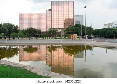 Dallas - May 13, 2015: A. Maceo Smith Federal Building In Dallas, Texas Reflected Across From Pioneer Square.