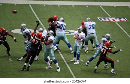 DALLAS - OCT 5: Taken In Texas Stadium In Irving, Texas On Sunday, October 5, 2008. Quarterback Tony Romo Is In The Pocket Throwing A Pass Down Field.