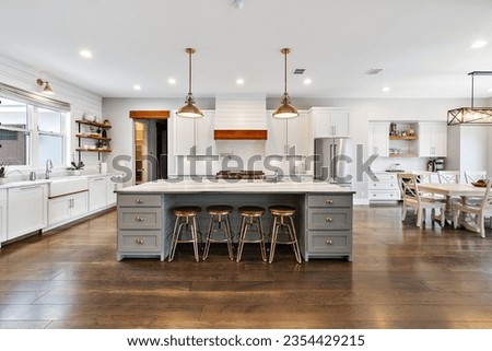Dallas, texas - July 18th 2023: a home kitchen with light fixtures 