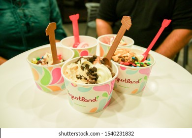 Dallas, Texas - June 19, 2017: Frozen Yogurt In Cups. Yogurtland Is An International Franchise Chain Of Frozen Yogurt Stores With Self Serve Format And Inexpensive Products.