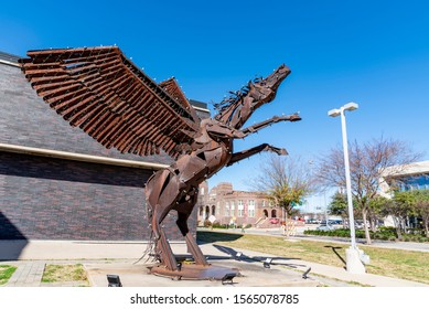 Dallas, Texas, USA December 21 2018. The Flying Winged Horse Sculpture Of Pegasus At Dallas Arts District’s Booker T. Washington High School For The Performing And Visual Arts