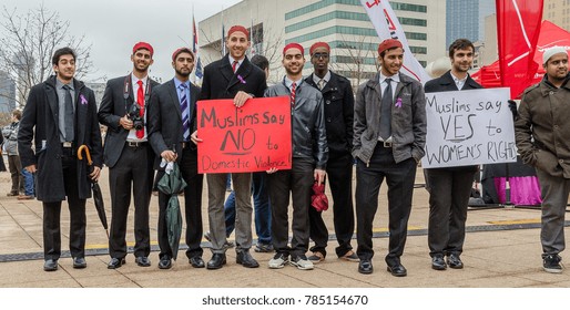 Dallas, Texas / USA - March 23, 2013: Group Of Muslims Holding Signs In Support Of The Mayor Mike Rawlings Dallas Rally Against Domestic Violence