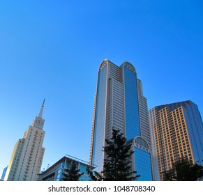 DALLAS, TEXAS, USA - OCTOBER 23, 2017. Buildings In Dallas Downtown Against A Bright Blue Sky Background. 
Open Scenic View Of American Skyscrapers And Architecture Of City Center District. 