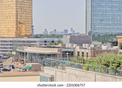 DALLAS, TEXAS, USA - SEPTEMBER 12, 2022: Dallas Shopping Mall In Front Of Distant Skyline