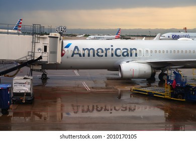 DALLAS, TX -18 MAY 2021- View of the reflection of the plane logo from American Airlines (AA) after the rain at the Dallas Fort Worth International Airport (DFW), the largest hub for American.