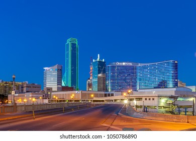 DALLAS, TX - DECEMBER 10, 2017 - Downtown Dallas Skyline At Night With Illuminated Glass Buildings Seen From Houston Street