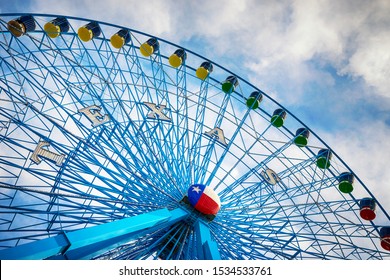 DALLAS, TX - October 17, 2019: Texas Star, The Largest Ferris Wheel In North America, Rises Above The Horizon At Fair Park In Dallas, Texas.