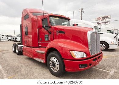 DALLAS, USA - APR 9, 2016: New Kenworth T680 High-roof Sleeper Semitrailer Truck At A Dealership In The United States