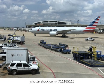 DALLAS, USA - AUG 8, 2017: DFW Airport with American Airlines craft on the patio getting ready to take off