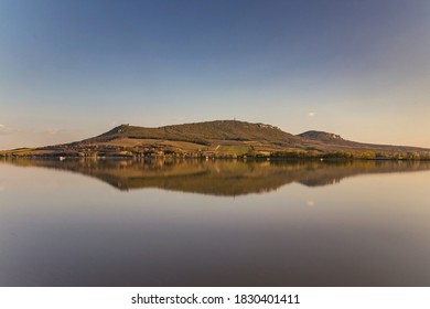 Nové Mlýny Dam with Pálava Hills in the background, reflected on the surface of the lake, South Moravia, Czech Republic