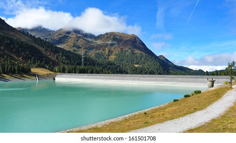 A Dam Holding Back Water In Kuhtai, Austria