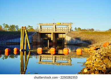 A dam on Hillsborough river at Tampa, Florida at sun set	 - Shutterstock ID 2250282353