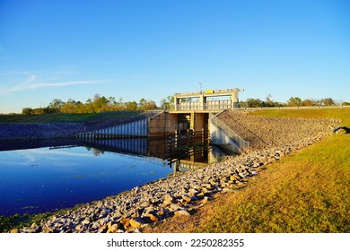 A dam on Hillsborough river at Tampa, Florida at sun set	 - Shutterstock ID 2250282355