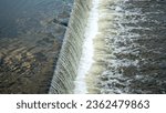 dam on a small river, water level drop