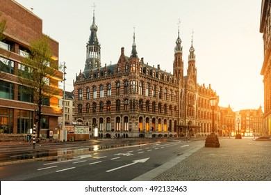 Dam square in morning at Amsterdam, Netherlands. Landscape and nature travel, or historical building and sightseeing concept