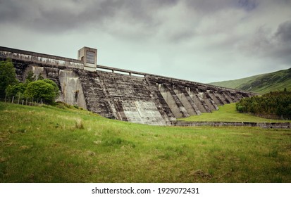 The Dam Wall Of Loch Daimh Reservoir Water Supply In The Scottish Highlands, UK Landscapes.