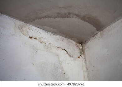 Damage Caused By Water Leakage On A Wall And Ceiling